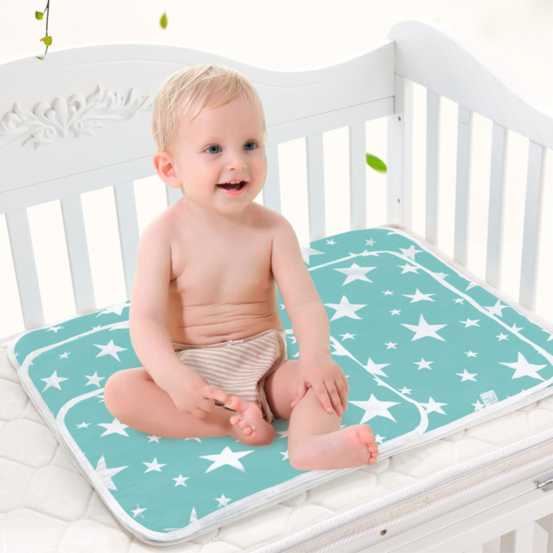 مقاوم للماء قابلة لإعادة الاست - مراجعة Changing Table Topper وسعره